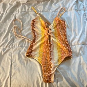 Puakenikeni one piece - no tag but fits small - medium